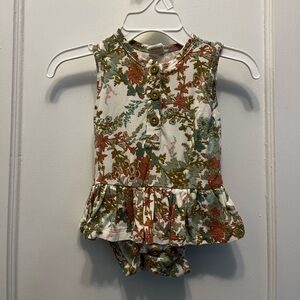 Kate Quinn ruffled onesie